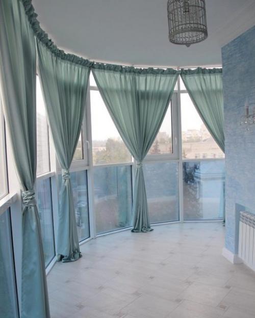 Дизайн панорамного балкона и лоджии. Панорамное остекление, виды и особенности 11 Дизайн панорамного балкона и лоджии. Панорамное остекление, виды и особенности 11