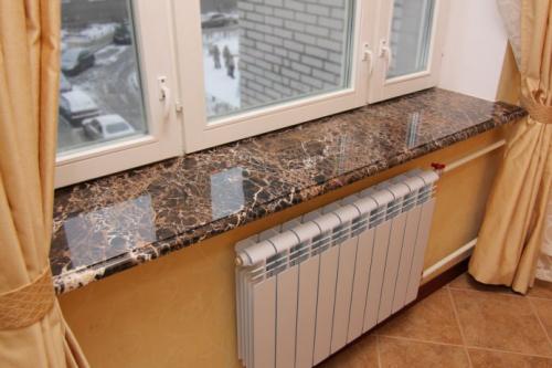 Как выглядит отделка декоративным камнем и обоями. Мебель и изделия из искусственного камня в интерьере 06