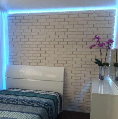 Декоративная гипсовая плитка на стену. Гипсовая плитка на стену (фото): область применения декоративной отделки из гипса под камень и кирпич в современном интерьере