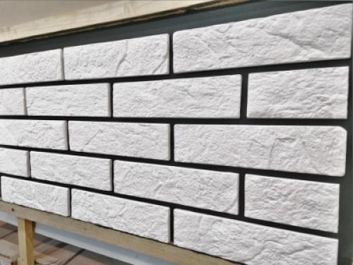 Чем и как приклеить декоративный камень. Укладка декоративного кирпича без расшивки швов 04 Чем и как приклеить декоративный камень. Укладка декоративного кирпича без расшивки швов 04